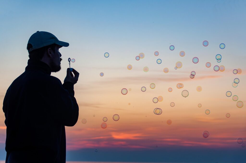 soap bubbles, blowing bubbles, sunset, man, silhouette, nature, life, dusk, twilight